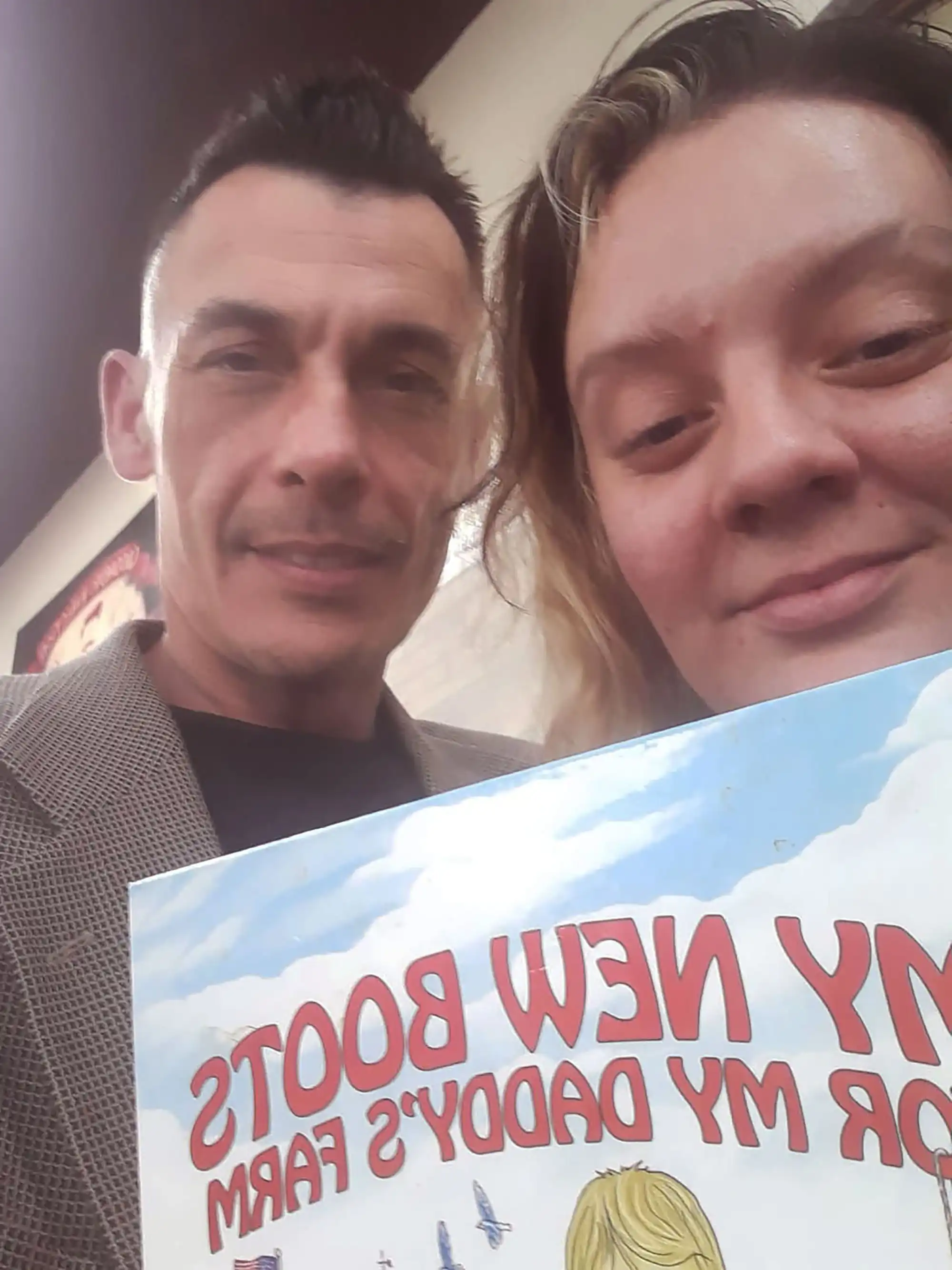 Book fans in Florida, author David Haave gets a haircut and signs books for everyone, FL, USA, 2022.